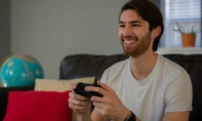 Candid photo of a man having a good time playing video games